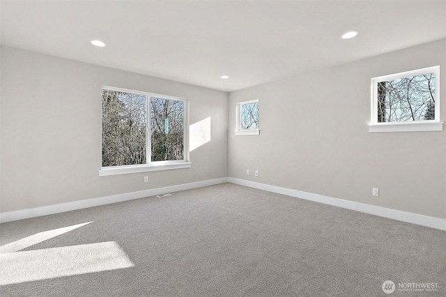 15709LOT12 SE 257th St, Covington, WA 98042 - empty room featuring recessed lighting, carpet, and baseboards