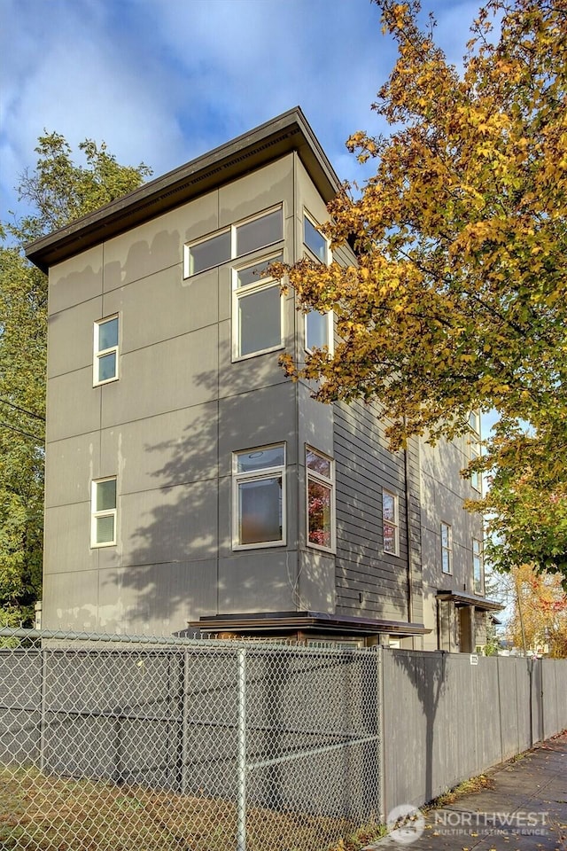 3325 Martin Luther King Jr Way S, Seattle, WA 98144 - view of side of home with fence