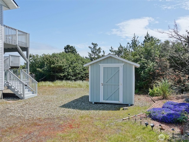 view of shed featuring stairs