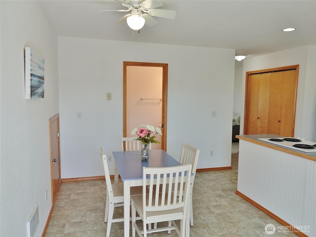 dining area with a ceiling fan, baseboards, and recessed lighting