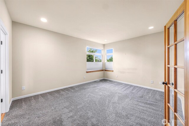 549 E Maberry Dr, Lynden, WA 98264 - carpeted spare room featuring baseboards, recessed lighting, and french doors