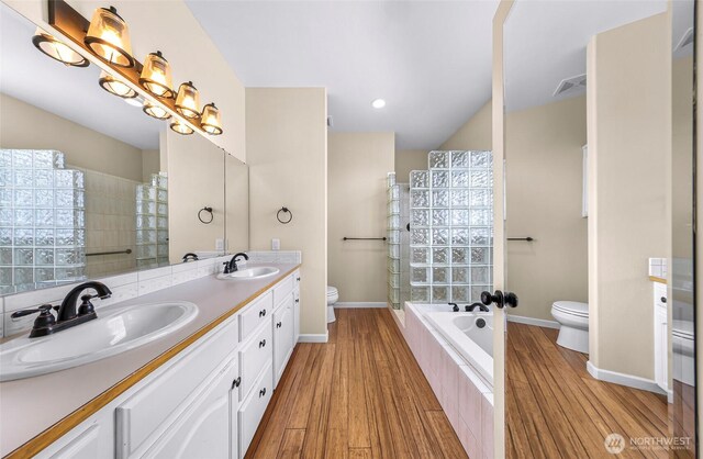 549 E Maberry Dr, Lynden, WA 98264 - full bath with toilet, a tile shower, baseboards, and recessed lighting