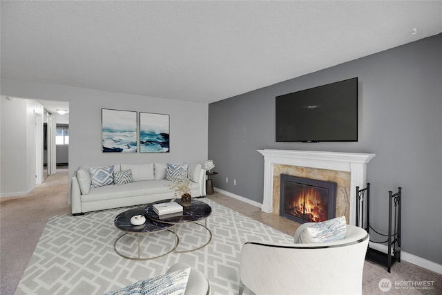 13739 15th Ave NE Unit B9, Seattle, WA 98125 - living area with light colored carpet, baseboards, and a premium fireplace