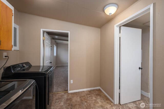 2008 S Belair Dr, Moses Lake, WA 98837 - laundry area with washer and dryer, electric panel, ornamental molding, cabinet space, and baseboards