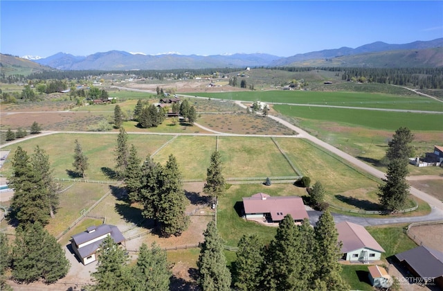 view of property location with rural landscape and mountains