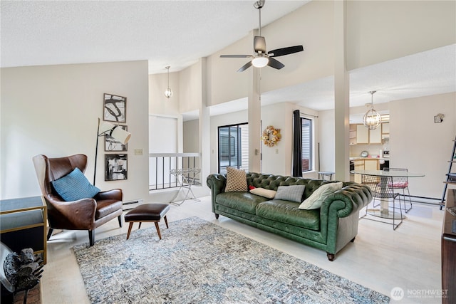 15930 NE 15th St, Bellevue, WA 98008 - living room featuring a ceiling fan, light wood finished floors, high vaulted ceiling, and a baseboard radiator