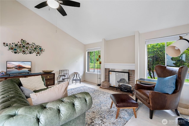 15930 NE 15th St, Bellevue, WA 98008 - living room featuring a ceiling fan, vaulted ceiling, and a brick fireplace