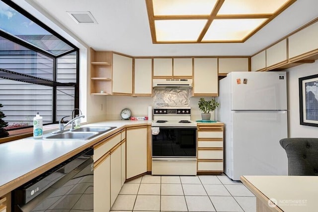 15930 NE 15th St, Bellevue, WA 98008 - kitchen featuring white appliances, under cabinet range hood, a sink, and cream cabinetry