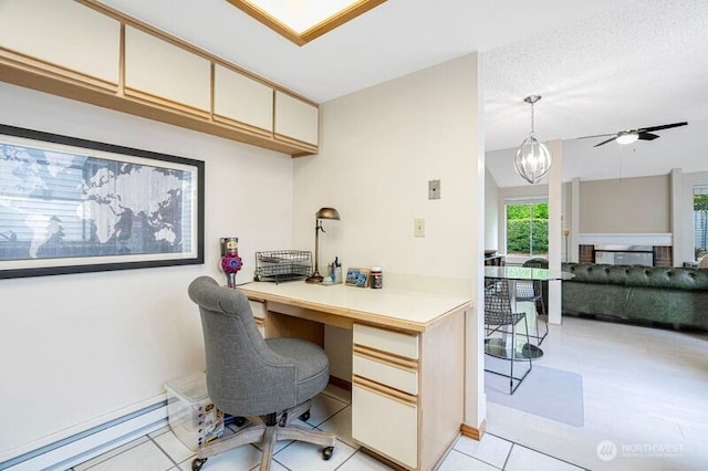 15930 NE 15th St, Bellevue, WA 98008 - office area with a ceiling fan, a baseboard heating unit, light tile patterned flooring, and a fireplace
