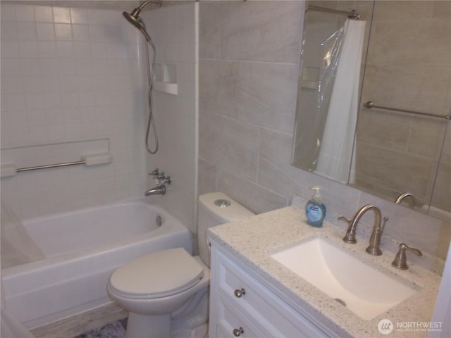 full bathroom featuring toilet, shower / bath combo with shower curtain, vanity, tile walls, and backsplash