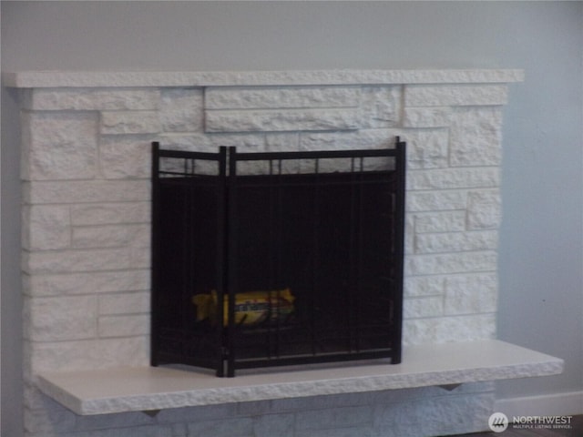 detailed view of a fireplace with raised hearth