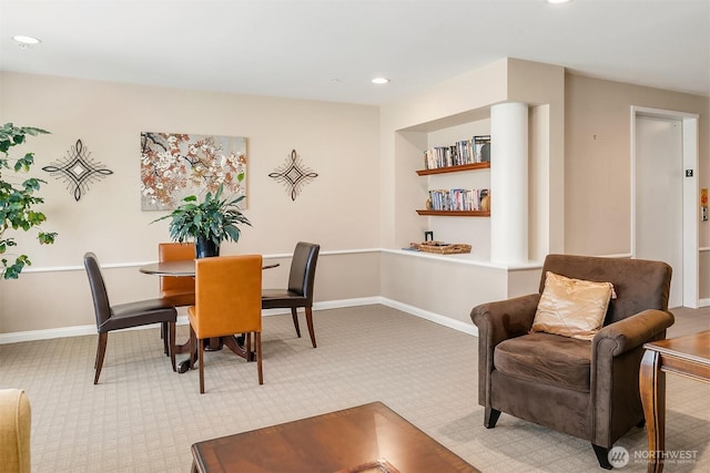 dining space featuring carpet flooring, recessed lighting, and baseboards