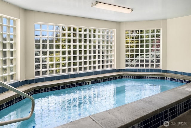 view of pool with a pool