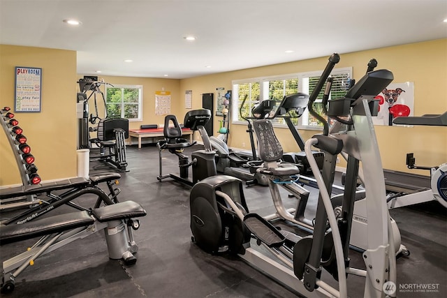 exercise room with recessed lighting