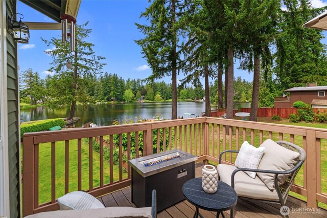 35449 34th Ave S, Auburn, WA 98001 - wooden terrace with a water view, an outdoor fire pit, a yard, and view of scattered trees
