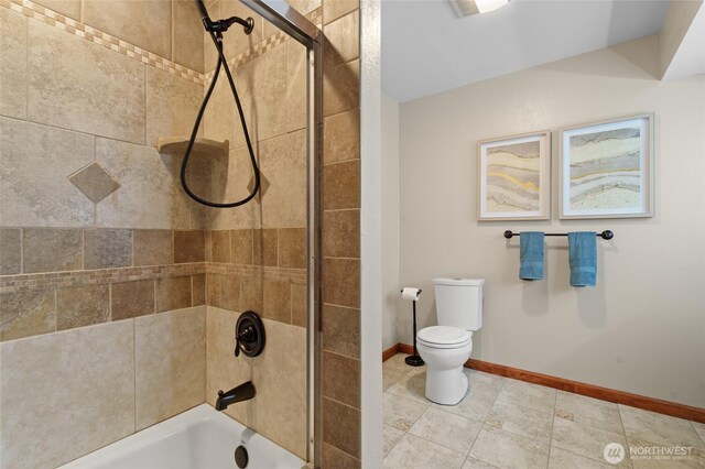 35449 34th Ave S, Auburn, WA 98001 - full bath with toilet, shower / tub combination, baseboards, and tile patterned flooring