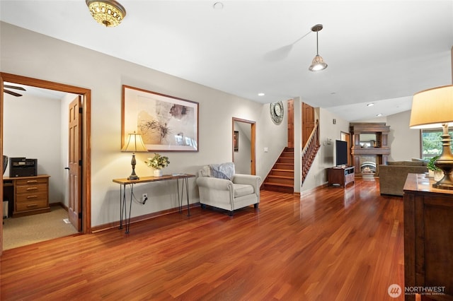35449 34th Ave S, Auburn, WA 98001 - living area with a fireplace, wood finished floors, stairway, and baseboards