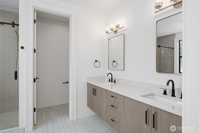 1831 4th St Unit A, Kirkland, WA 98033 - full bath with a shower stall, tile patterned flooring, double vanity, and baseboards