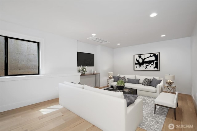1831 4th St Unit A, Kirkland, WA 98033 - living room featuring wood finished floors, recessed lighting, and baseboards