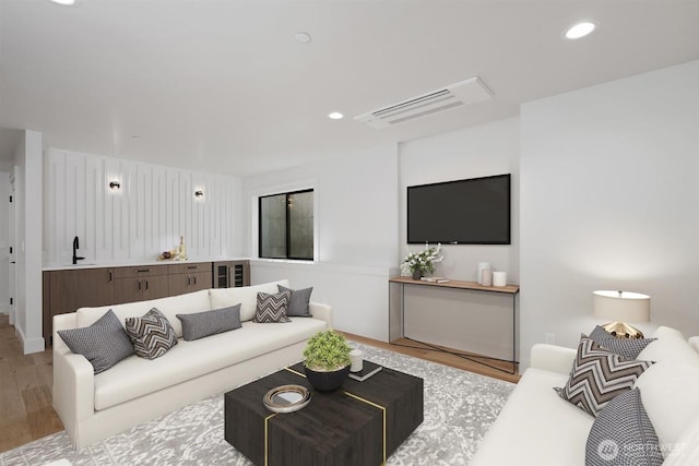 1831 4th St Unit A, Kirkland, WA 98033 - living room featuring light wood-style flooring and recessed lighting