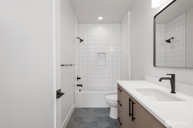 1831 4th St Unit A, Kirkland, WA 98033 - full bathroom with vanity, toilet, tile patterned flooring, recessed lighting, and washtub / shower combination