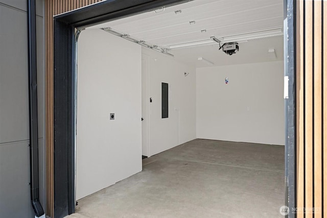 1831 4th St Unit A, Kirkland, WA 98033 - garage featuring a garage door opener and electric panel