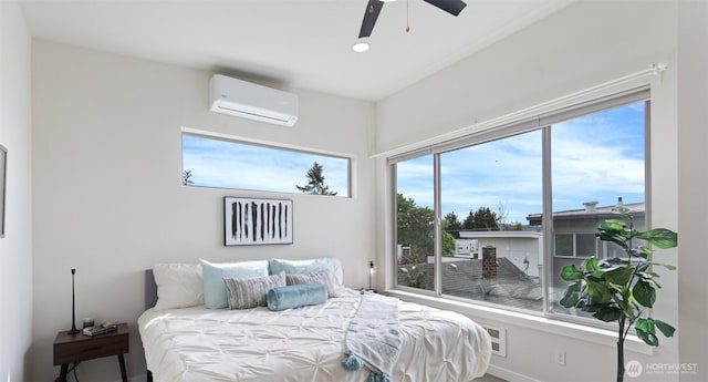 bedroom with a wall mounted AC, a ceiling fan, recessed lighting, and baseboards