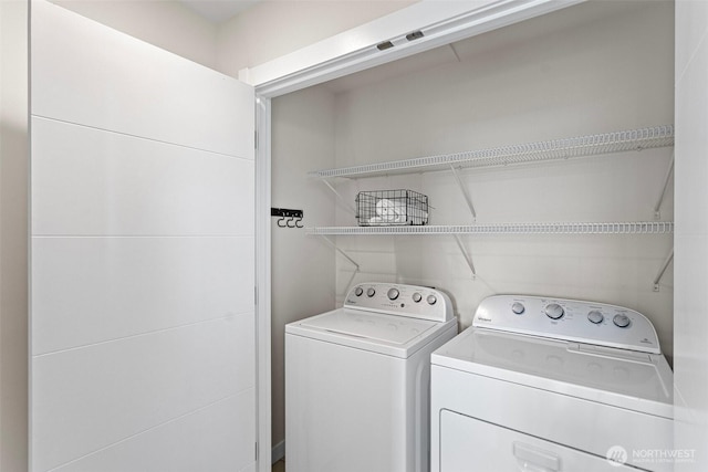 laundry area with washer and clothes dryer