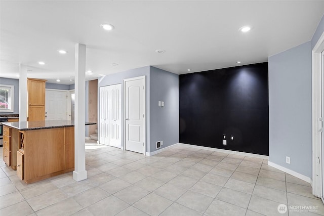 1526 192nd St SE Unit P4, Bothell, WA 98012 - unfurnished living room featuring recessed lighting, light tile patterned floors, and baseboards