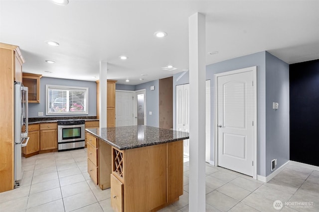 1526 192nd St SE Unit P4, Bothell, WA 98012 - kitchen with electric stove, freestanding refrigerator, light tile patterned floors, a kitchen island, and recessed lighting