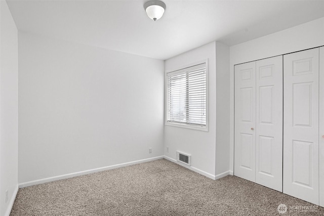1526 192nd St SE Unit P4, Bothell, WA 98012 - unfurnished bedroom with carpet floors, baseboards, and a closet