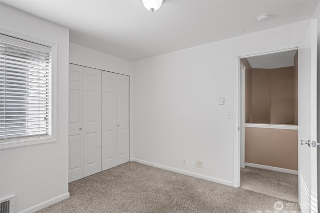 1526 192nd St SE Unit P4, Bothell, WA 98012 - unfurnished bedroom with carpet flooring, a closet, and baseboards