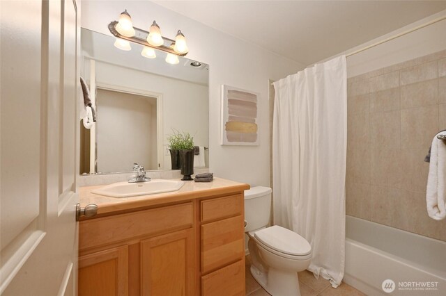 full bathroom with toilet, tile patterned floors, vanity, and shower / tub combo with curtain