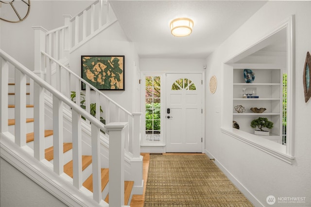 5222 W Mercer Way, Mercer Island, WA 98040 - foyer entrance with stairway and baseboards