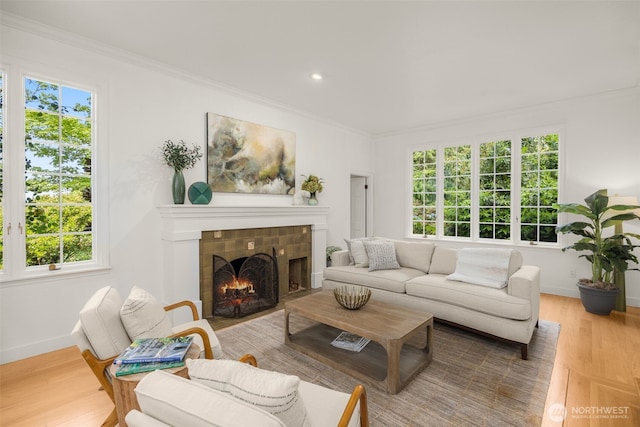 5222 W Mercer Way, Mercer Island, WA 98040 - living area featuring crown molding, baseboards, a tile fireplace, wood finished floors, and recessed lighting