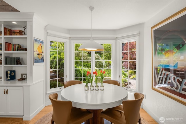5222 W Mercer Way, Mercer Island, WA 98040 - dining area with healthy amount of natural light and light wood finished floors