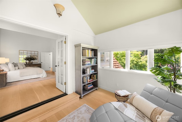 5222 W Mercer Way, Mercer Island, WA 98040 - sitting room featuring french doors, light wood-style flooring, high vaulted ceiling, and baseboards