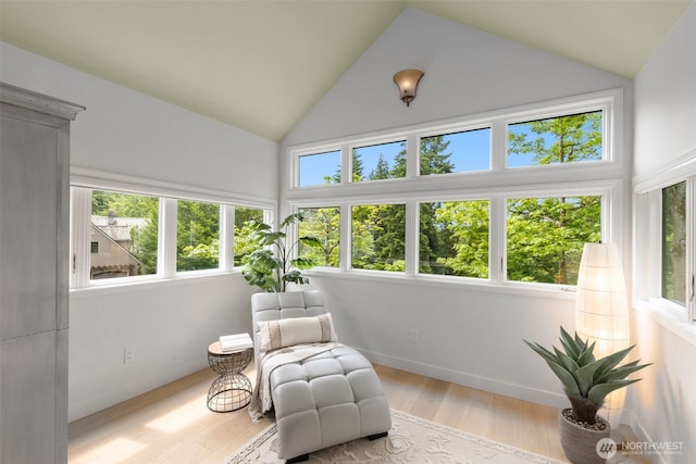 5222 W Mercer Way, Mercer Island, WA 98040 - sunroom / solarium with wood finished floors, high vaulted ceiling, and baseboards