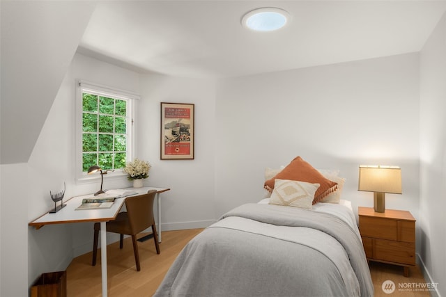 5222 W Mercer Way, Mercer Island, WA 98040 - bedroom featuring light wood-style flooring and baseboards
