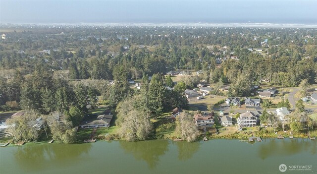 712 Mt Olympus Ave SE, Ocean Shores, WA 98569 - aerial view of property's location featuring a nearby body of water and a heavily wooded area