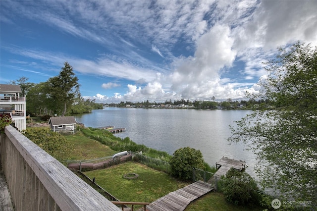 712 Mt Olympus Ave SE, Ocean Shores, WA 98569 - water view featuring fence and a boat dock