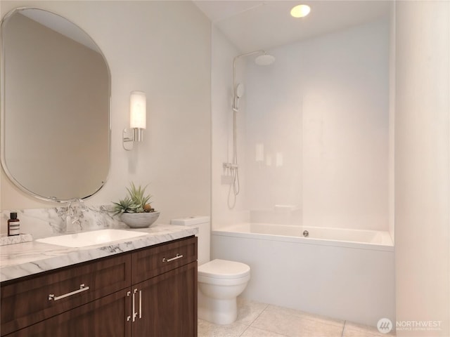 bathroom with tile patterned flooring, toilet, vanity, and shower / tub combination
