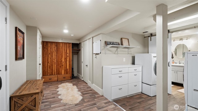 laundry room featuring wood finished floors