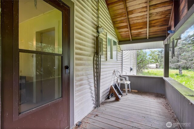 wooden deck featuring covered porch