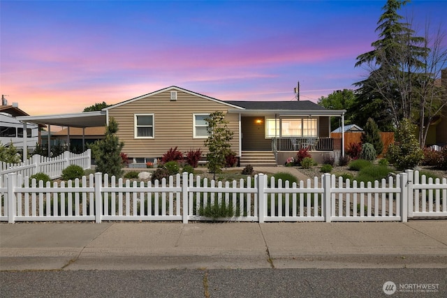 78 Whitten St, Richland, WA 99354 - view of front of property featuring a porch, a fenced front yard, and an attached carport