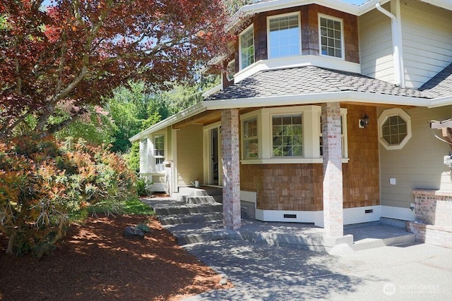 view of front of house featuring crawl space