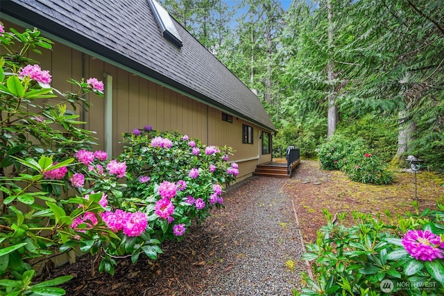 436 E Pointes Dr E, Shelton, WA 98584 - view of side of property featuring a shingled roof and a wooden deck