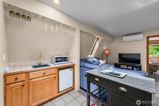 436 E Pointes Dr E, Shelton, WA 98584 - kitchen with white microwave, a wall mounted air conditioner, fridge, open floor plan, and a sink