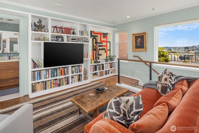 1009 Western Ave Unit 1203, Seattle, WA 98104 - living room with ornamental molding and wood finished floors