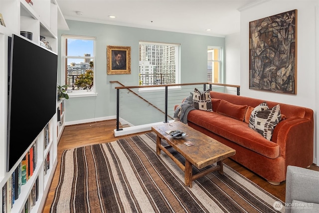 1009 Western Ave Unit 1203, Seattle, WA 98104 - living room featuring wood finished floors, baseboards, crown molding, and recessed lighting